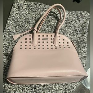 Soft pink tote with silver studding detailed front